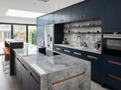 Kitchen with blue countertop and apron photo
