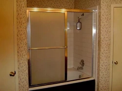 Bathtub with compartment doors photo