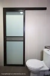 Bathtub With Compartment Doors Photo