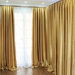 Golden curtains in the living room photo