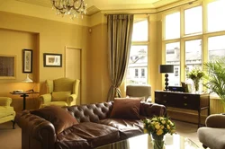 Golden Curtains In The Living Room Interior