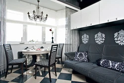 Dark kitchen design with sofa