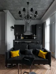Dark kitchen design with sofa