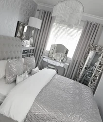 White curtains in the bedroom interior