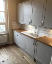 Gray Kitchen With Wood-Look Countertop Photo