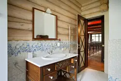 Bathroom in a wooden house design photo