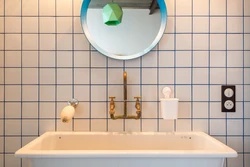 Ерітінді плиткалары бар ванна бөлмесінің дизайны