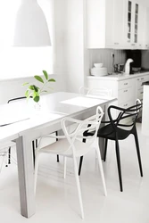 White kitchen table in the kitchen interior