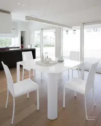 White kitchen table in the kitchen interior