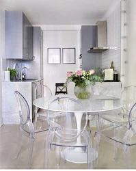 White kitchen table in the kitchen interior