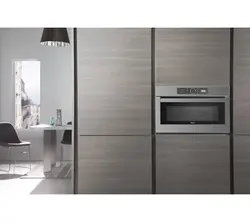 Built-in microwave oven photo in the kitchen interior