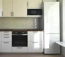 Built-in microwave oven photo in the kitchen interior