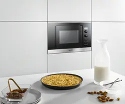 Built-in microwave oven photo in the kitchen interior