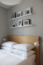 Shelf Above The Bed In The Bedroom Photo