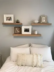 Shelf above the bed in the bedroom photo