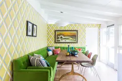 Yellow sofa in the kitchen in the interior photo
