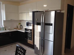 Separate refrigerator in the kitchen photo