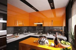 Orange-black kitchen in the interior photo