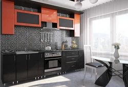 Orange-black kitchen in the interior photo