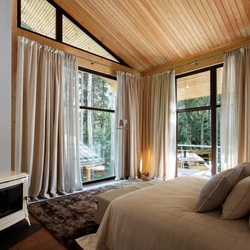 Curtains In A Wooden Bedroom Photo