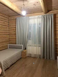 Curtains in a wooden bedroom photo