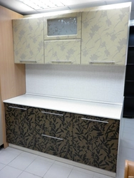 Self-adhesive paste over kitchen photo