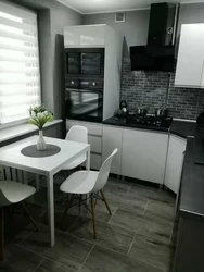 Gray kitchen in Khrushchev in the interior