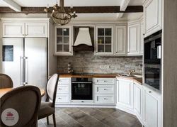 White Kitchen With Brown Countertop Photo In The Interior