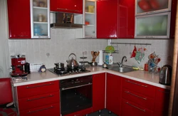 Red interior of a small kitchen