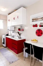 Red interior of a small kitchen