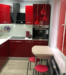 Red interior of a small kitchen