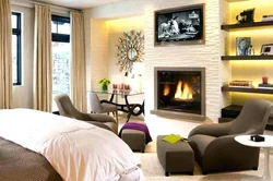 Electric fireplace in the bedroom interior photo