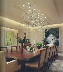 Modern chandeliers in the kitchen above the table photo