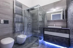 Gray bathroom design with shower