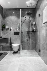 Gray bathroom design with shower