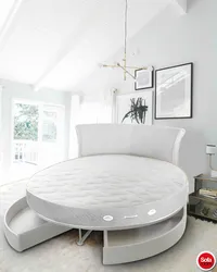 Round bed in the bedroom interior