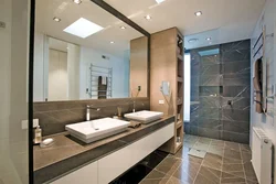 Bathroom design with wall-to-wall mirror