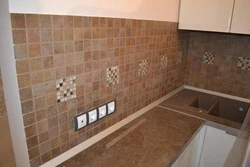 Lay tiles in the kitchen apron photo