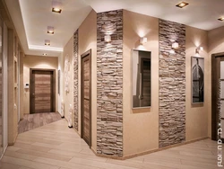 Hallway with decorative stone and wallpaper photo