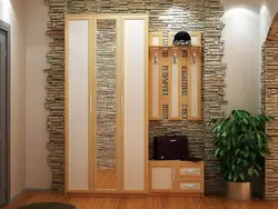 Hallway with decorative stone and wallpaper photo