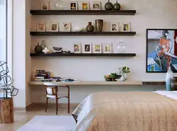 Bedroom Interior With Shelves On The Entire Wall
