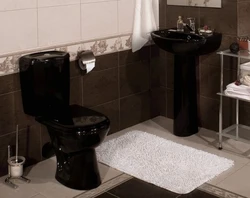 Bathroom Design With Black Toilet And Sink