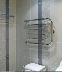 Electric Heated Towel Rail In The Bathroom Photo