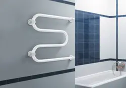 Electric Heated Towel Rail In The Bathroom Photo