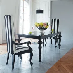 Black table and chairs in the kitchen photo