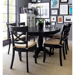 Black table and chairs in the kitchen photo