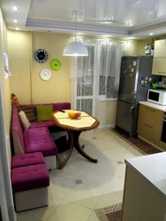 Kitchen 11 sq.m. with balcony design with sofa