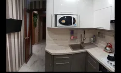 Khrushchev kitchen design refrigerator in the corner