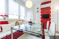 Дизайн гостиной с красной кухней