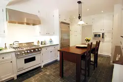 Kitchen with freestanding stove photo